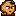 A small brown creature, 16 by 16 pixels, drawn in four shades.